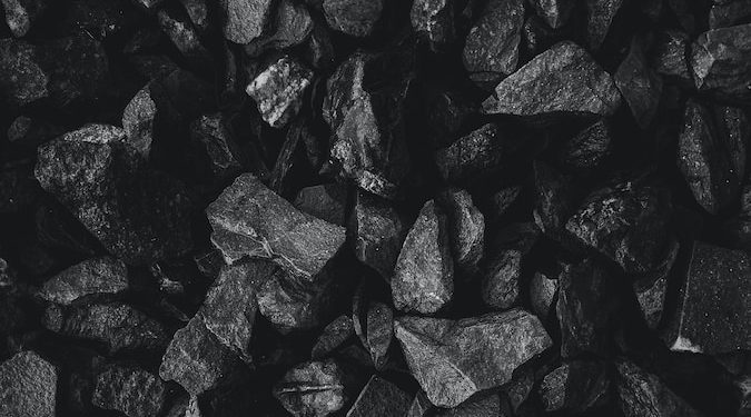grayscale photo of stone