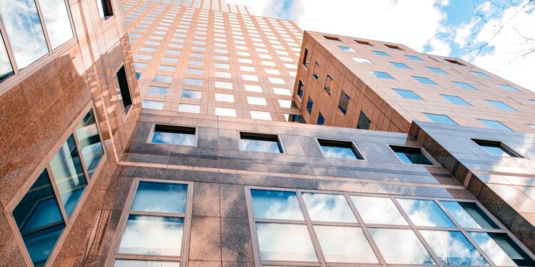 blue and white concrete building under blue sky