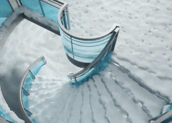 A modern staircase nestled in a snowy landscape.