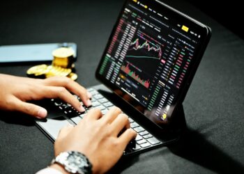 person using black laptop computer