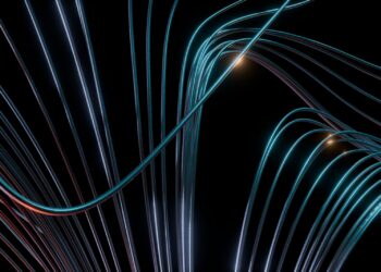 Abstract blue and orange glowing lines on black background