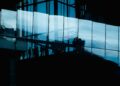 Modern building facade with glass reflections