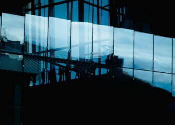 Modern building facade with glass reflections