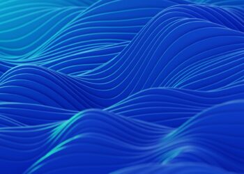 an abstract blue background with wavy lines