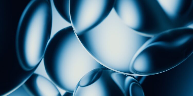 Abstract blue spheres with bright highlights
