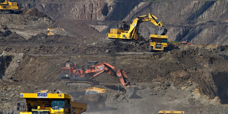 photography of excavators at mining area
